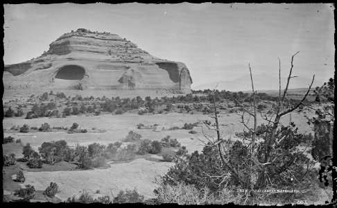 Cave rocks near Sierra La Sal, Dry Valley, Utah. Scene of Gardiner's encounter with the Indians. - NARA - 517194