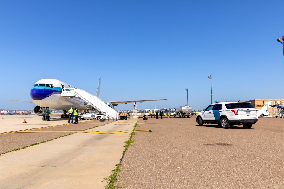 Celebrity Eclipse passengers disembark in San Diego to a jet waiting to take them to their home countries - 49739181078