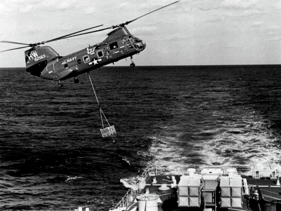 CH-46D Sea Knight of HC-6 replenishes USS Caron (DD-970), in 1981