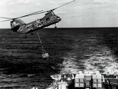CH-46D Sea Knight of HC-6 replenishes USS Caron (DD-970), in 1981