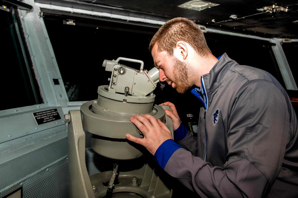 College Basketball Teams Tour USS Stennis during Pearl Harbor 75th Commemoration 161204-N-DA737-035