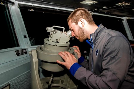 College Basketball Teams Tour USS Stennis during Pearl Harbor 75th Commemoration 161204-N-DA737-035