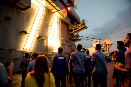 College Basketball Teams Tour USS Stennis during Pearl Harbor 75th Commemoration 161204-N-DA737-028