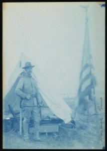 Colonel George Herbert Harries, standing near tent at the Rough Riders military camp, Montauk Point, New York LCCN2013651523