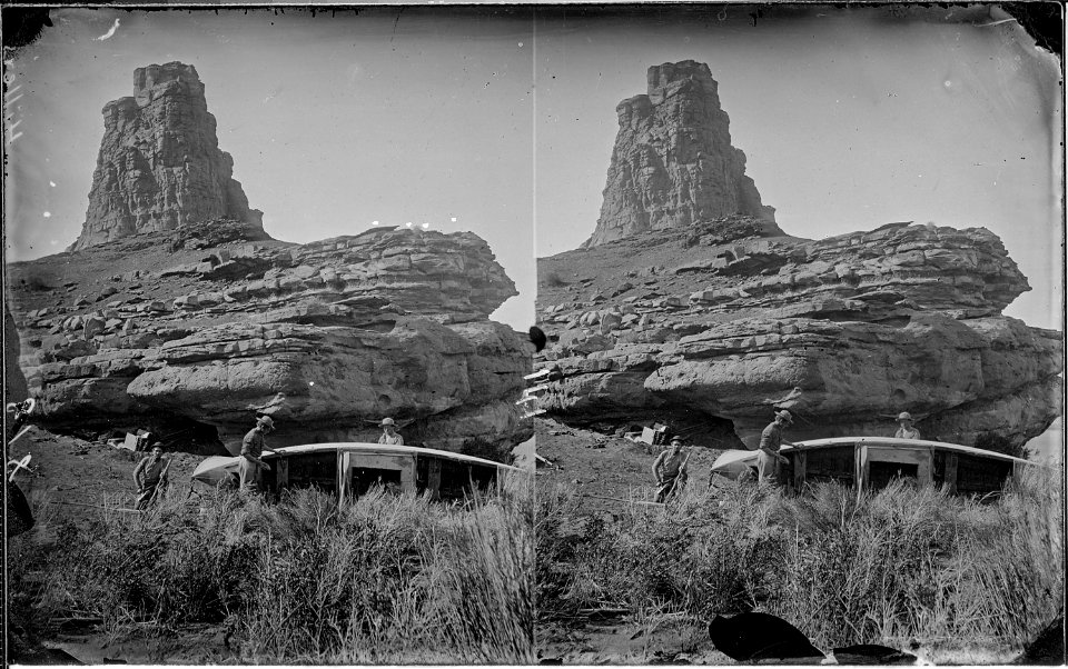 Colorado River. On right bank a little below mouth of Fremont River, 1872. Repairing a boat which - NARA - 517973