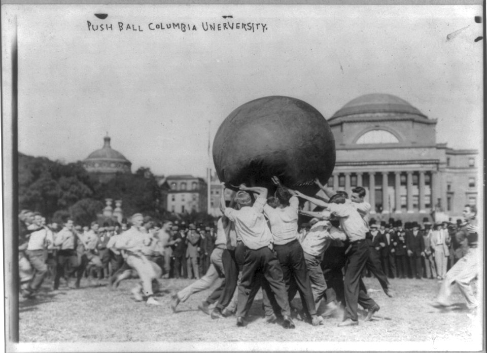 Columbia University- Push-Ball. Male students holding up huge ball. LCCN2016650678