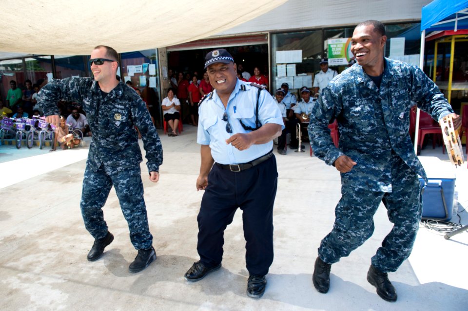 Combined concert with police band and Pacific Partnership Joint Band 150610-N-MK341-444