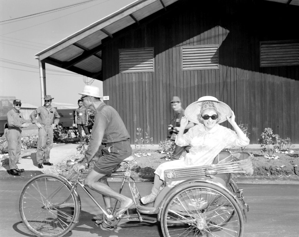 Comedienne Phyllis Diller smiles for the camera as the Bob Hope Christmas show arrives at Korat Air Base, Thailand... - NARA - 542302