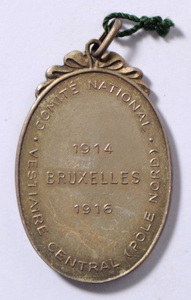 Comité National Vestiaire Central, medal by Pierre Theunis, Belgium, (1915), Coins and Medals Department of the Royal Library of Belgium, 2Lef 38 - 96 (verso)