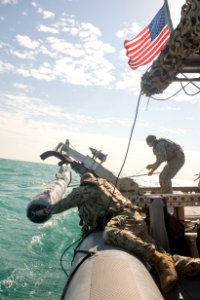 Commander, Task Group 56.1 Mine Countermeasure Platoon 601 launches and recovers Mark 18 Mod 2 Kingfish Unmanned Underwater Vehicles 141201-N-MF909-162