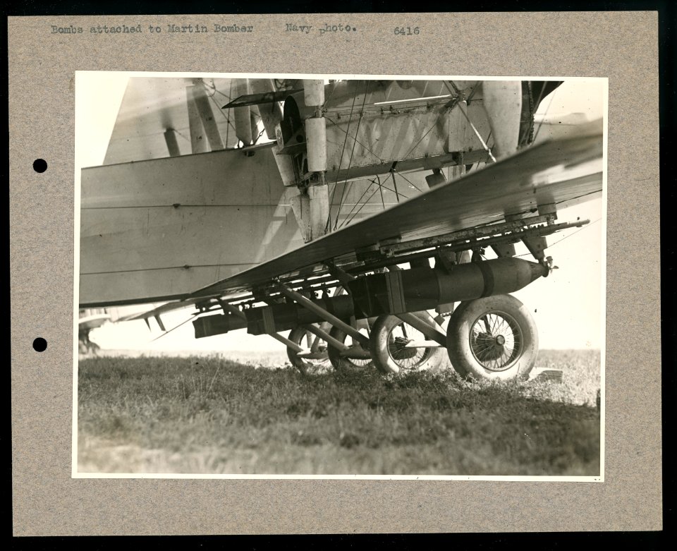 Bombs attached to Martin Bomber - Navy photo. LCCN2016645665