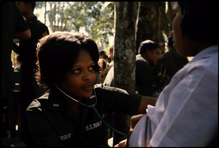 Bong Son Village, Thailand. First Lieutenant Linda J. Bowser, an Air Force nurse with the 8th TFW Med-Cap team... - NARA - 542334