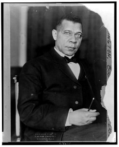 Booker T. Washington, three-quarter length portrait, seated, facing slightly right with right hand in lap LCCN2001700490 photo