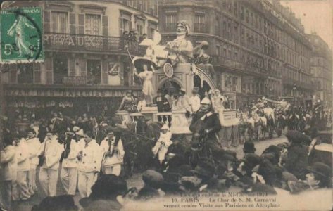 Char de Sa Majesté Carnaval venant rendre visite aux Parisiens en Aéroplane