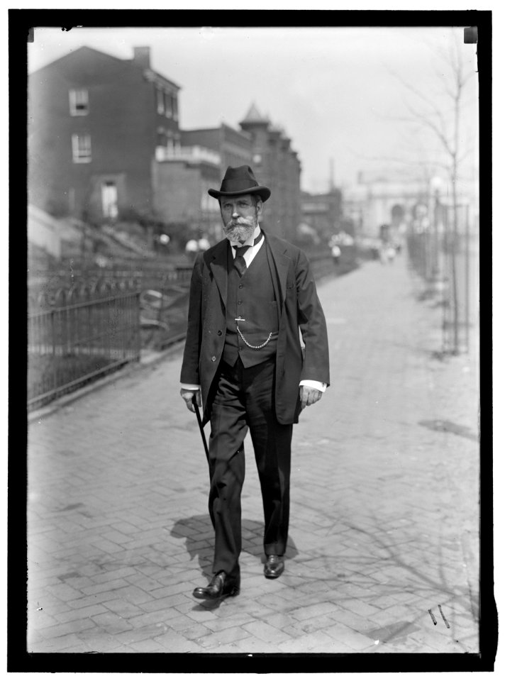 Charles Evans Hughes, 1862-1948, walking away from Union Station, Washington, D.C., perhaps on Louisiana Avenue LOC hec.02423