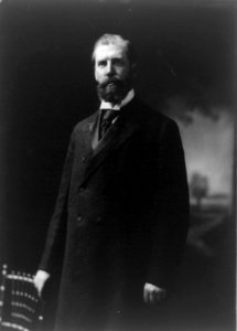 Charles Evans Hughes, three-quarter length portrait, standing, facing left LCCN96513404