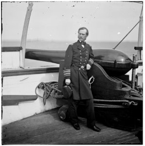 Charleston Harbor, South Carolina. Rear Adm. John A. Dahlgren standing by a Dahlgren gun on deck of U.S.S. PAWNEE LOC cwpb.02991