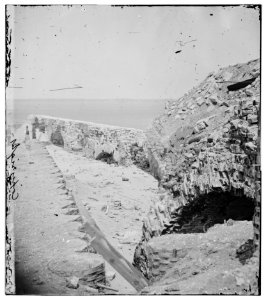 Charleston, South Carolina. Samuel Cooley, photographer with his camera on the battered parapet of Fort Sumter LOC cwpb.02303