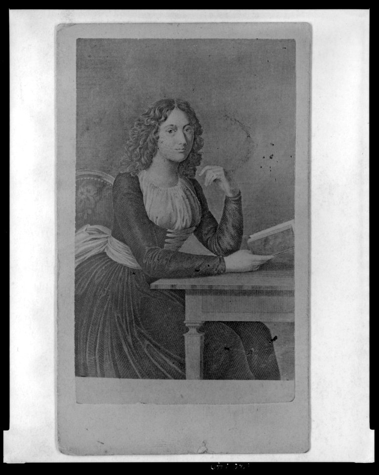 Charlotte von Lengefeld Schiller, wife of German dramatist Friedrich Schiller, seated at a table holding a book, facing front, three-quarter length portrait LCCN2004678564