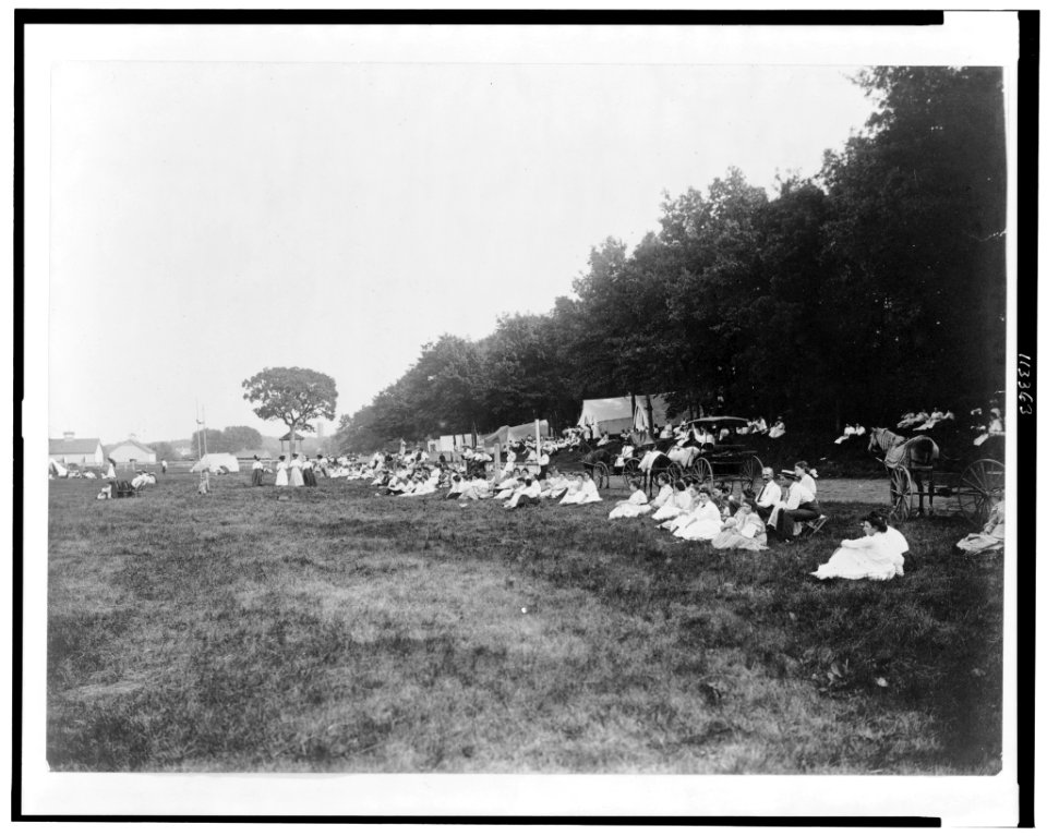 Chautauqua Park, with tents, crowds seated on grass outdoors, Charles City, Iowa LCCN95504326