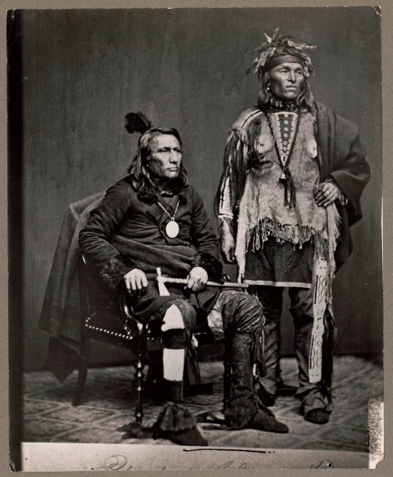 Chief Crane, Potawatomi, holding tomahawk and unidentified Native American man in delegation to Washington, D.C. LCCN2007678836