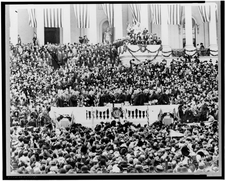 Chief Justice Edward D. White administering the oath of office to Woodrow Wilson on the east portico of the U.S. Capitol, March 4, 1913 LCCN00650961