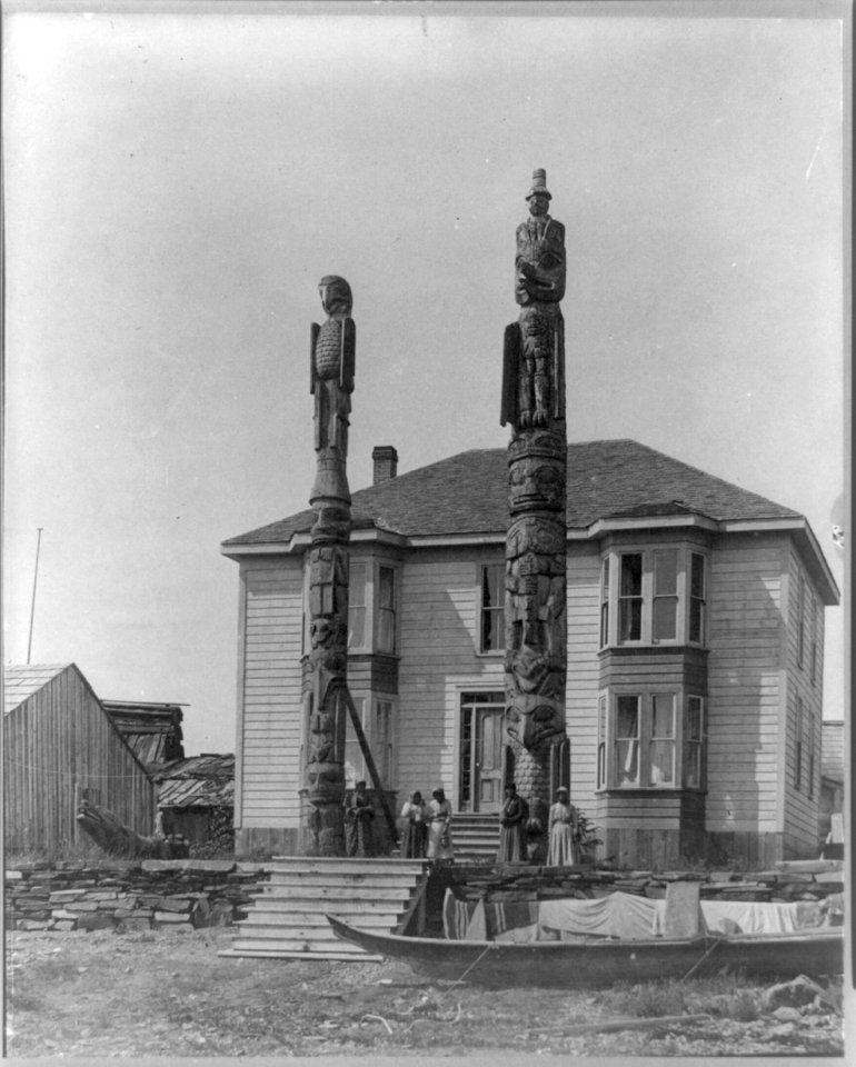Chief Katalaan's house, flanked by totem poles, Wrangel, Alaska LCCN2016651325