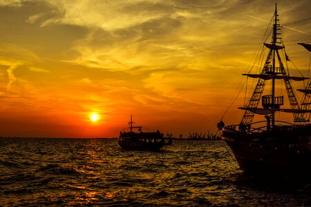 Boat sky clouds photo