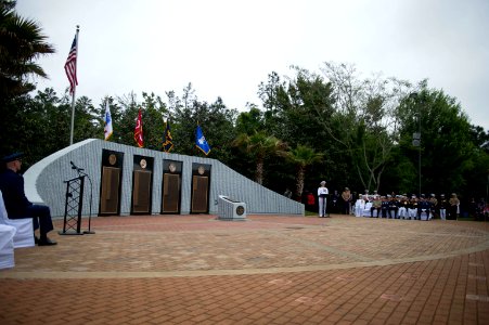 Chief of Naval Operations U.S. Navy Adm. Jonathan W. Greenert, at the lectern, speaks during the 44th annual EOD Memorial Ceremony May 4, 2013, at the Kauffman EOD Training Complex at Eglin Air Force Base, Fla 130504-N-WL435-075