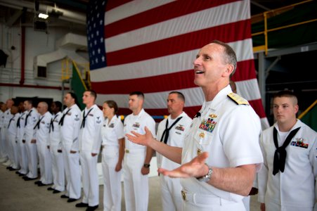 Chief of Naval Operations U.S. Navy Adm. Jonathan W. Greenert, foreground, speaks to Sailors and family members before reenlisting Sailors at an all-hands call at Naval Station Mayport, Fla., May 3, 2013 130503-N-WL435-013