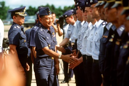 Chief Marshal Prapan of the Thai air force greets US Air Force personnel arriving for the joint Thai-US Air Force Exercise COMMANDO WEST VIII