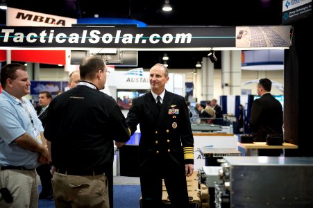 Chief of Naval Operations Adm. Jonathan Greenert talks to industry representatives at the Navy League's Sea-Air-Space Exposition in National Harbor, Md., April 8, 2013 130408-N-WL435-432