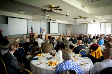Chief of Naval Operations U.S. Navy Adm. Jonathan W. Greenert, background, speaks at a Southeast Region Navy League luncheon in Jacksonville, Fla., May 3, 2013 130503-N-WL435-696 photo