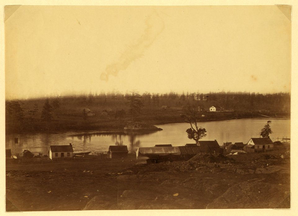Community adjacent to the fur trading post at Fort Victoria on Vancouver Island, British Columbia showing farm and buildings LCCN2005680426