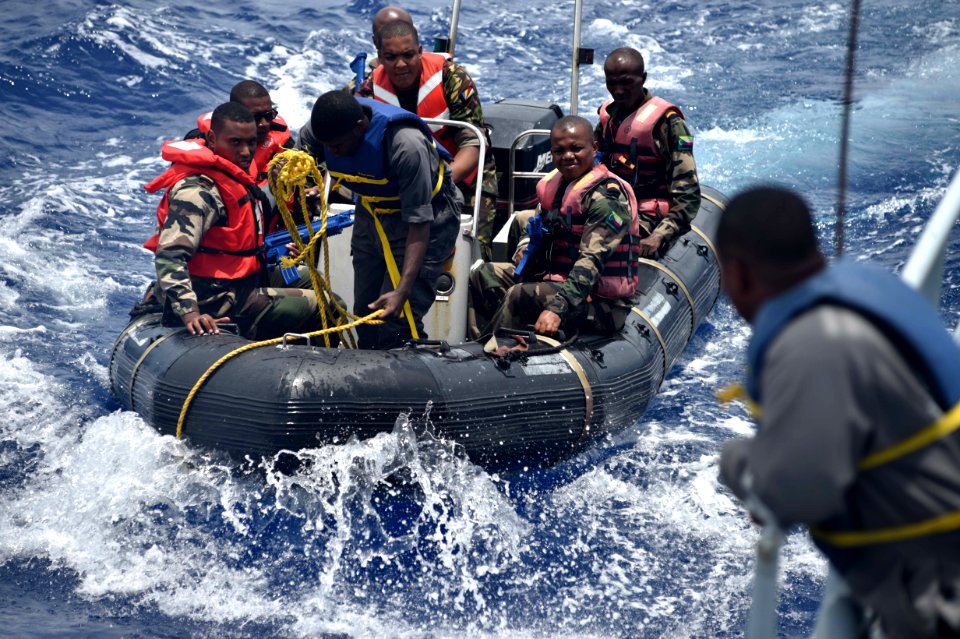 Comoros Sailors and Seychelles Coast Guardsmen prepare to recover a rigid hull inflatable boat during an Exercise Cutlass Express 2017