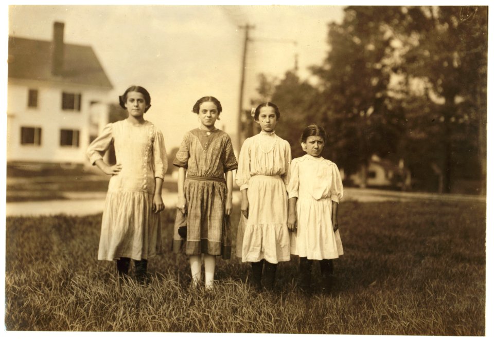 Comparison of ages- On right end is Mary Deschene, admitted 11 years, helped sister spool all summer in Glenallen Mill. Next her is Lumina Demarais, admitted 12 years, and doffing all summer LOC nclc.02300
