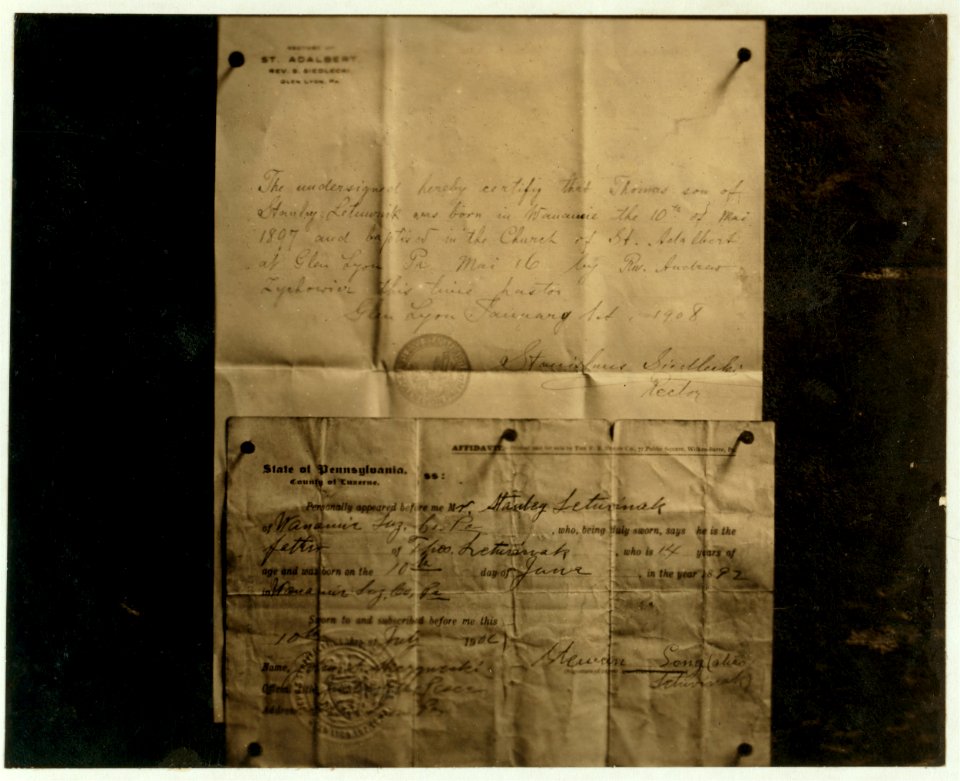 Comparison of Baptisimal Record and Age Certificate of Stanley Letuvinak (American name, Thomas Long). Born according to baptismal record May 10, 1897; date of birth given in age certificate LOC nclc.01149