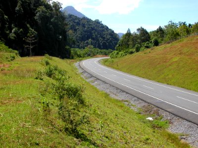Completed section of highway through previous jungle swamp area at Lhoong (4275094635)