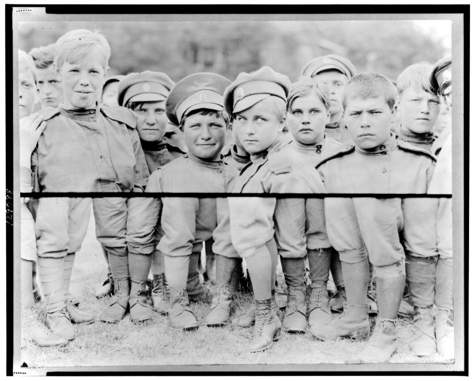 Composite photograph showing the faces and the shoes of a women's regiment from Petrograd LCCN2001701772
