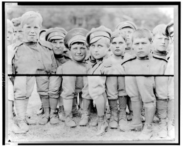 Composite photograph showing the faces and the shoes of a women's regiment from Petrograd LCCN2001701772