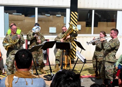 Concert in the pod for evacuees 210824-F-XM048-1113