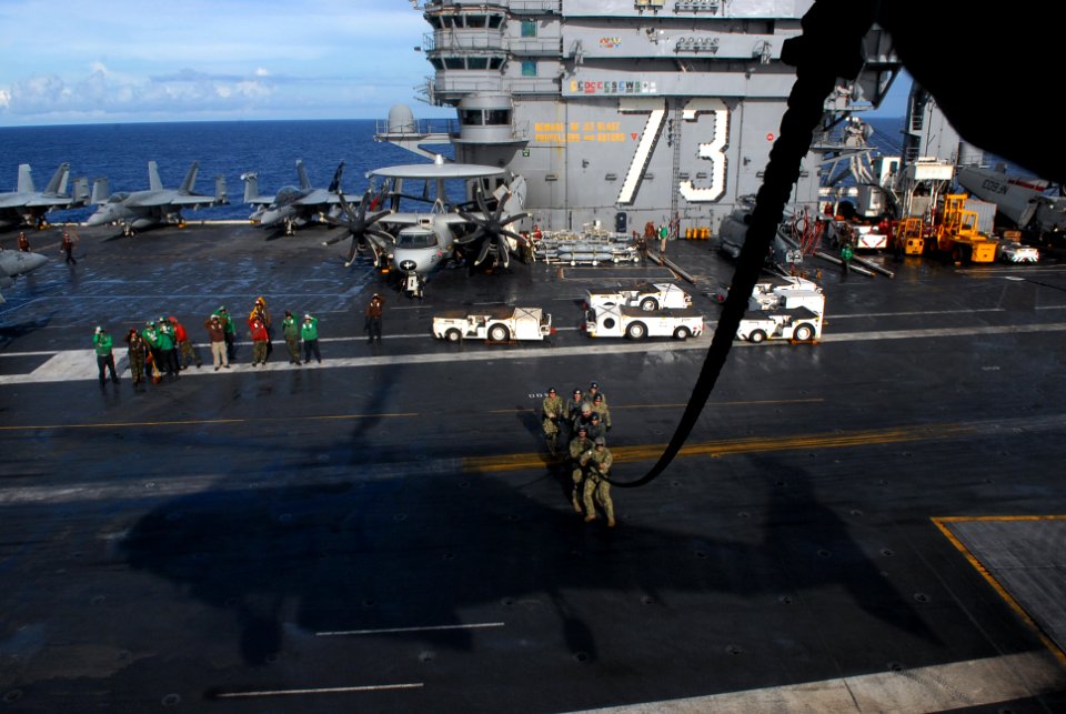 Conducting a fast rope and repelling exercise 120705-N-WW409-121