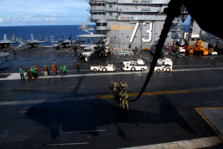 Conducting a fast rope and repelling exercise 120705-N-WW409-121