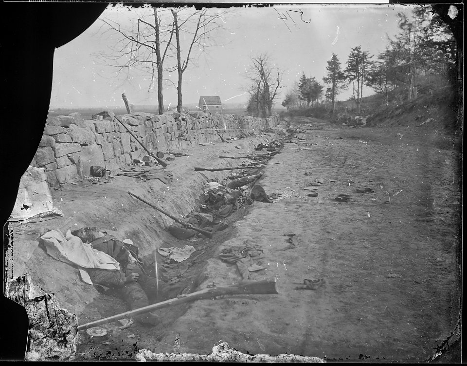 Confederate dead behind stone wall. The 6th. Maine Inf. penetrated the Confederate lines at this point.... - NARA - 524930