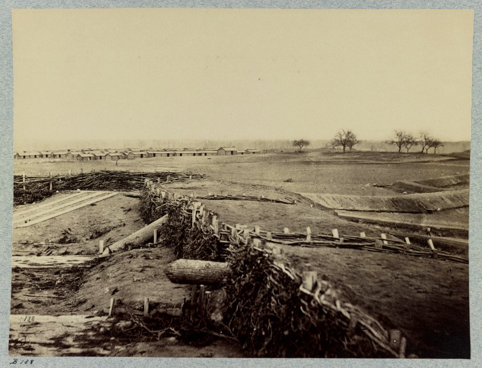 Confederate fortifications at Centreville, Va. March 1862. Quaker guns in foreground. Winter barracks in background LCCN2012646911