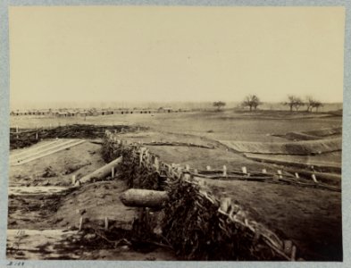 Confederate fortifications at Centreville, Va. March 1862. Quaker guns in foreground. Winter barracks in background LCCN2012646911