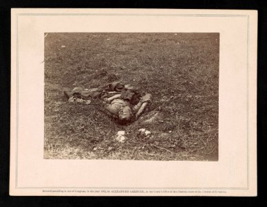 Confederate soldier, who, after being wounded, had dragged himself to a little ravine on the hill-side, where he died LCCN2014646927