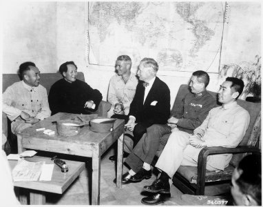 Conference at Yenan Communist Headquarters before Mao Tze Tung, chairman, left for Chungking meeting. Central figures... - NARA - 531400