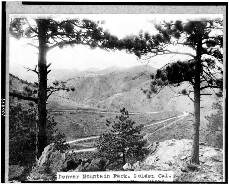 Denver Mountain Park, Golden, Colorado. View through trees overlooking road and mountains LCCN90715349