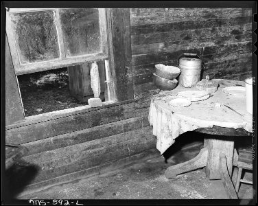 Detail of kitchen in home of Eddie Cain, Negro miner, who lives in company housing project. Adams, Rowe & Norman... - NARA - 540594